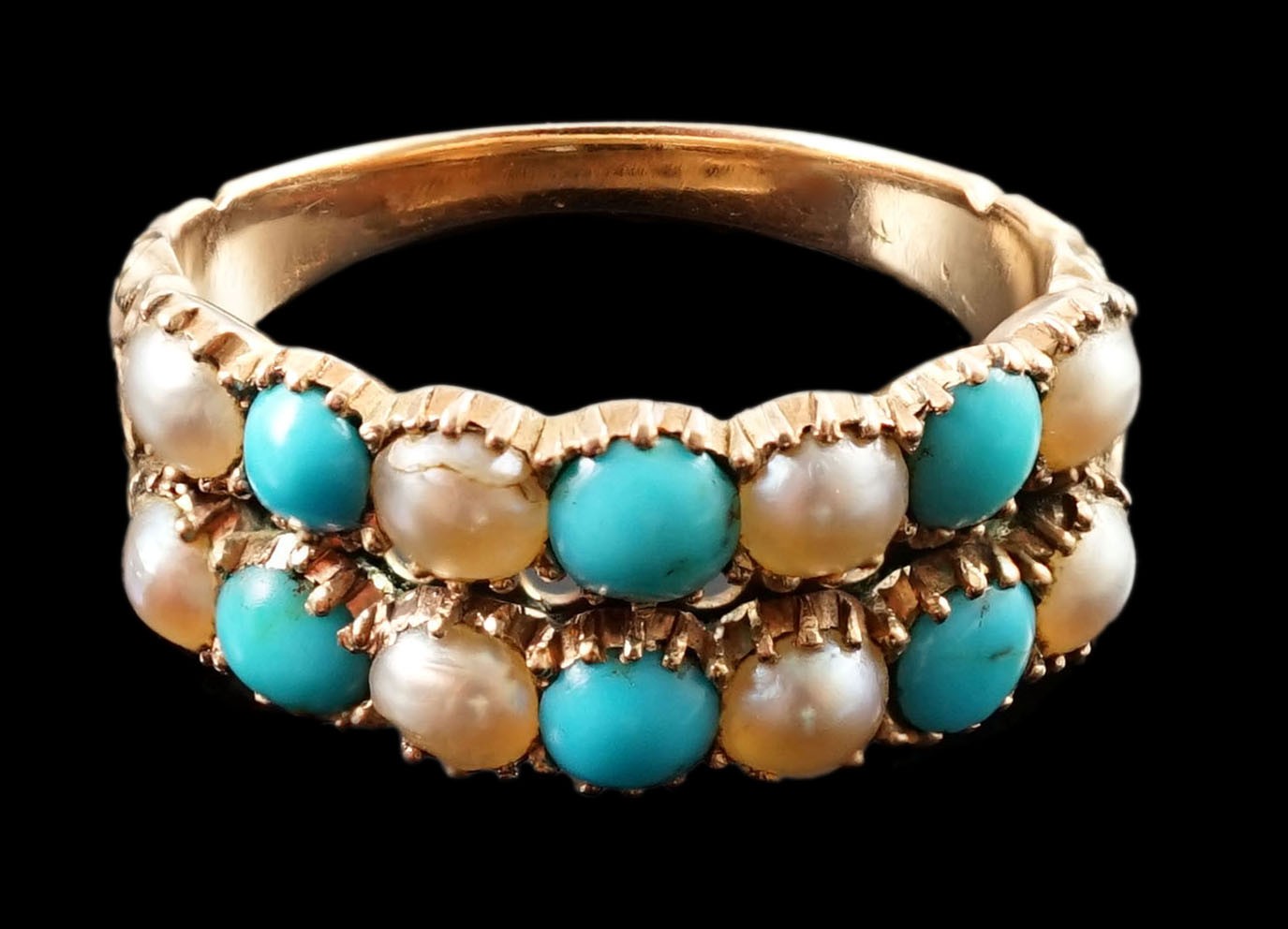 A Victorian gold two row turquoise and split pearl set half hoop ring